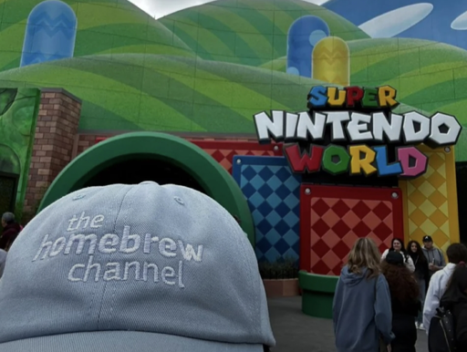 someone wearing a Homebrew Channel hat at Super Nintendo World
