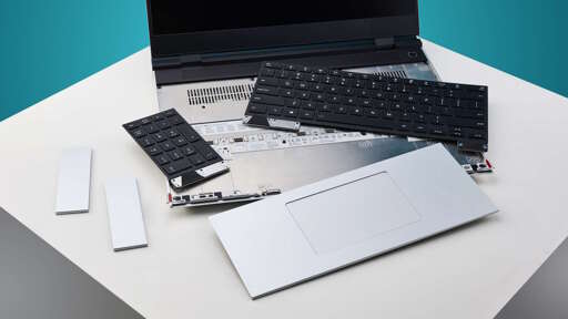 a laptop (framework 16) with re-attatchable trackpad and keyboard parts taken off