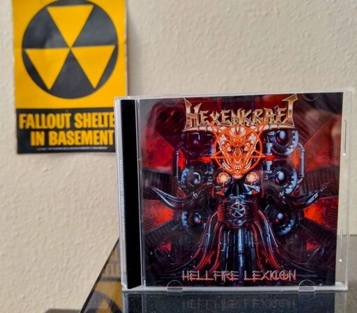 Cover of Hexenkraft's Hellfire Legion album, with a sort of firey skull motif