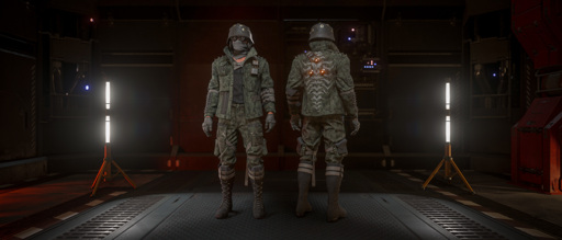 An in-game screenshot showing two characters, side by side. One facing forward, one facing back. Both wearing the rewarded clothing set.