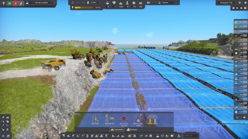 excavators and dump trucks climbing a vertical wall due to space contraints.