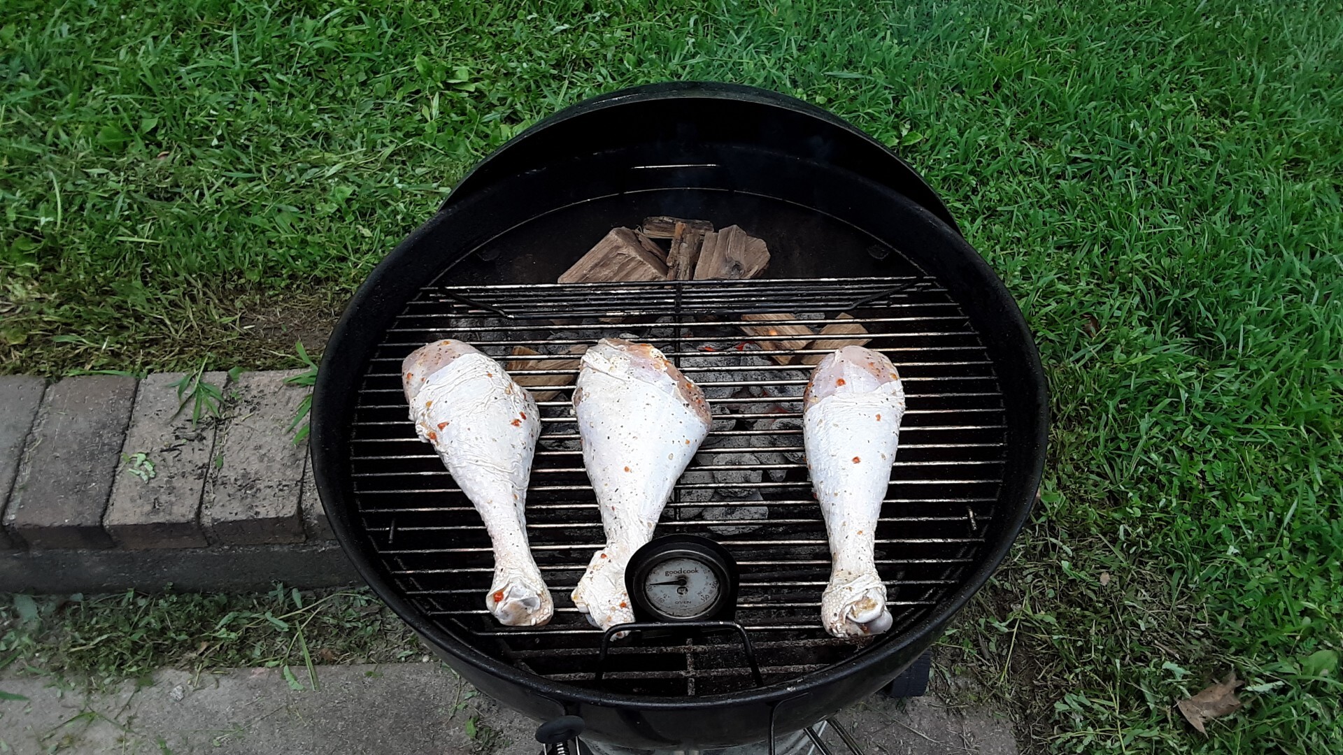 image of raw turkey legs on a barbecue grill