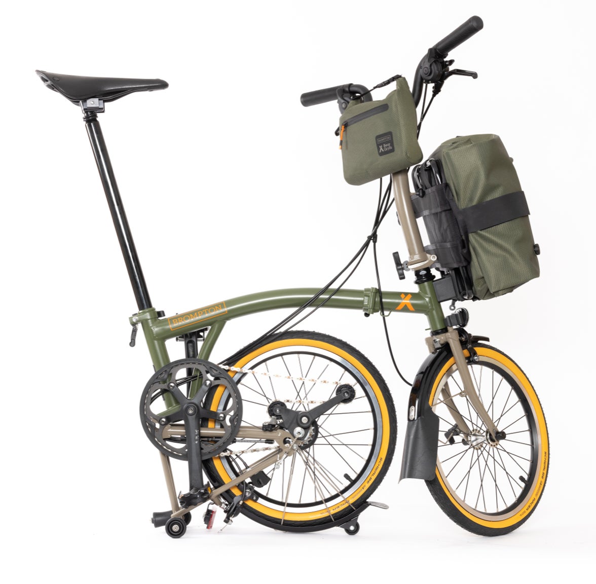 Side view of new "Brompton Beyond" with folded rear wheel and matching olive green bags